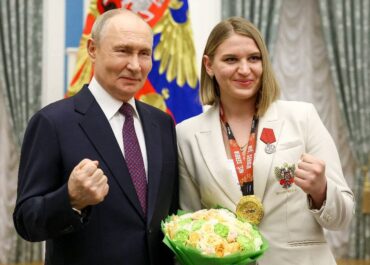 Владимир Путин и Анастасия Шамонова: фотосессия в боксерской стойке